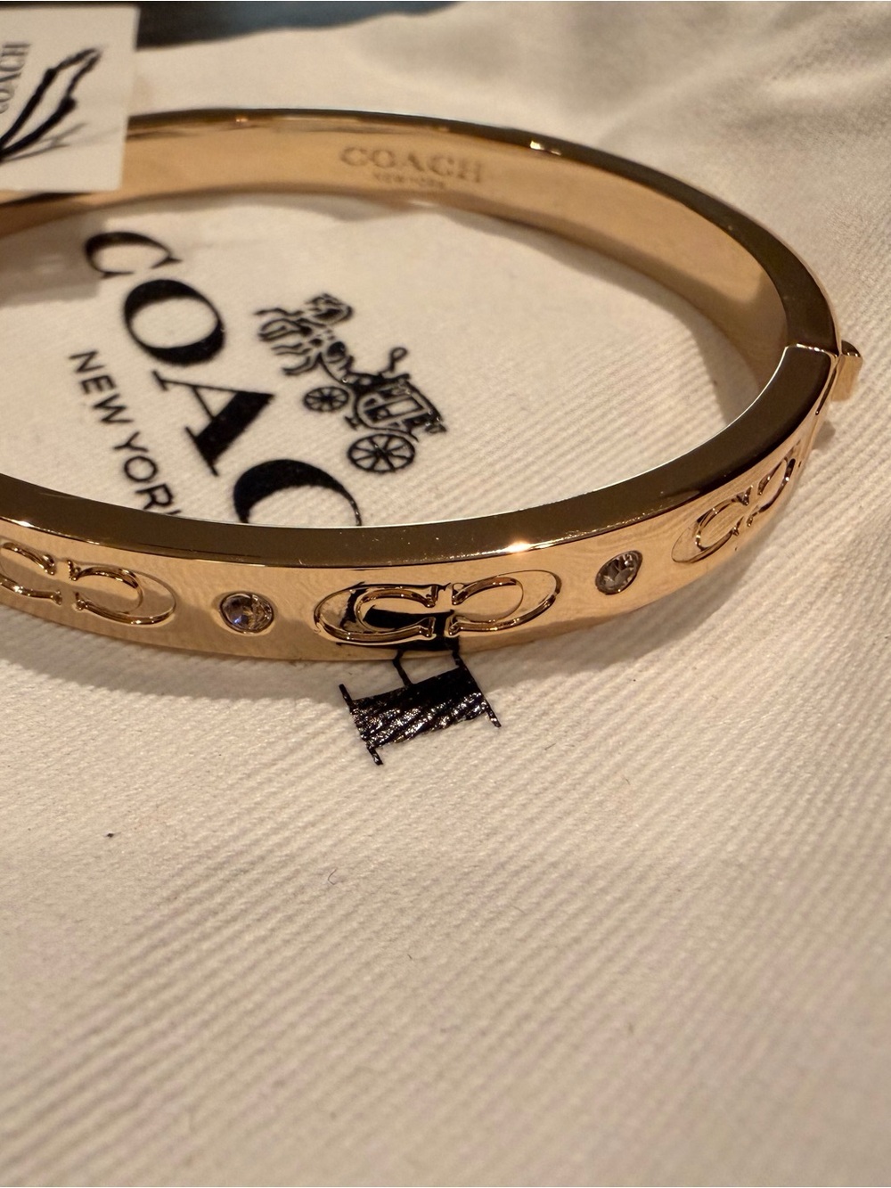 Coach Gold-Tone Signature Logo Crystal Bangle Bracelet - Picture 9 of 9